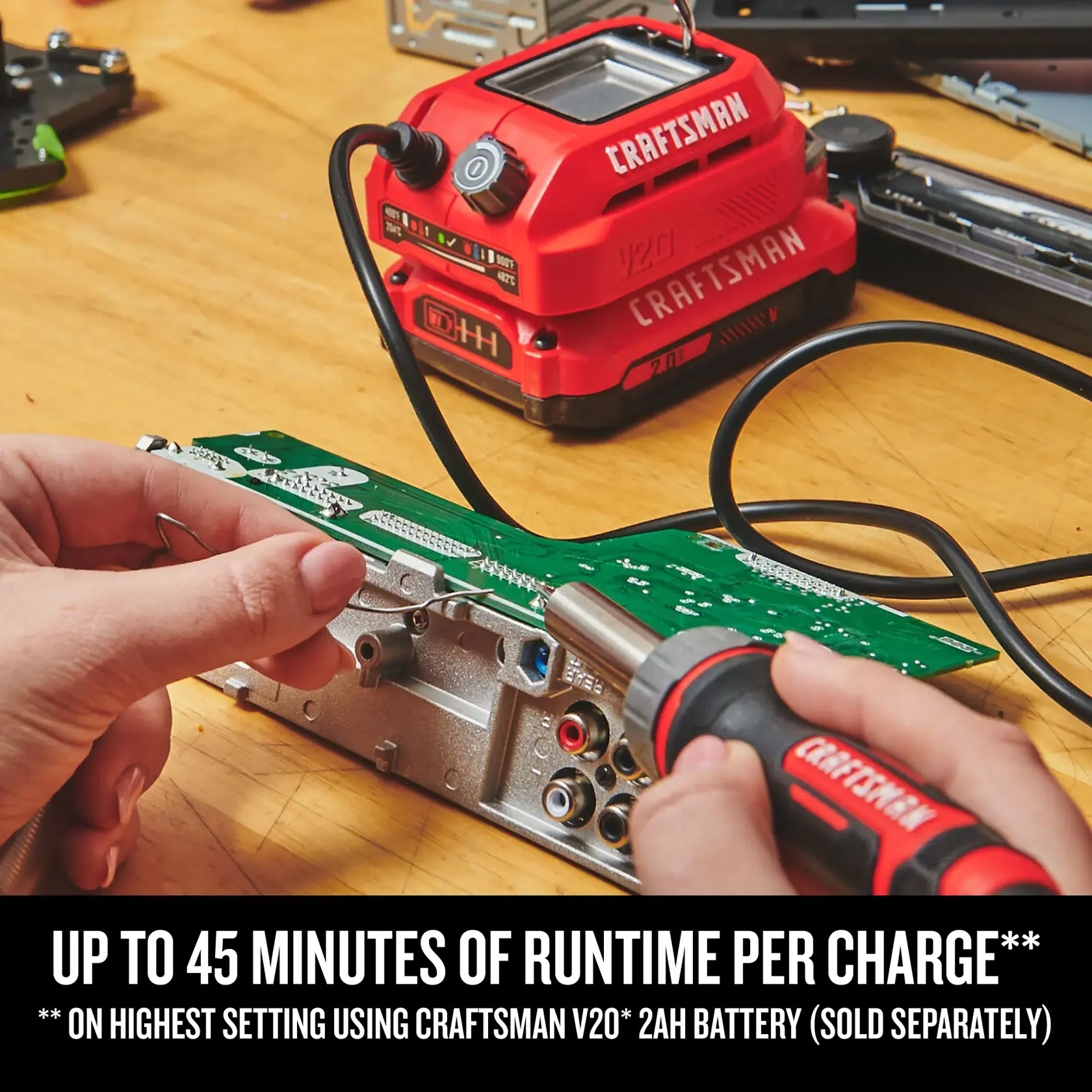 Person using CRAFTSMAN(R) V20 Soldering Iron on computer components, highlighting up to 45 minutes of runtime per charge