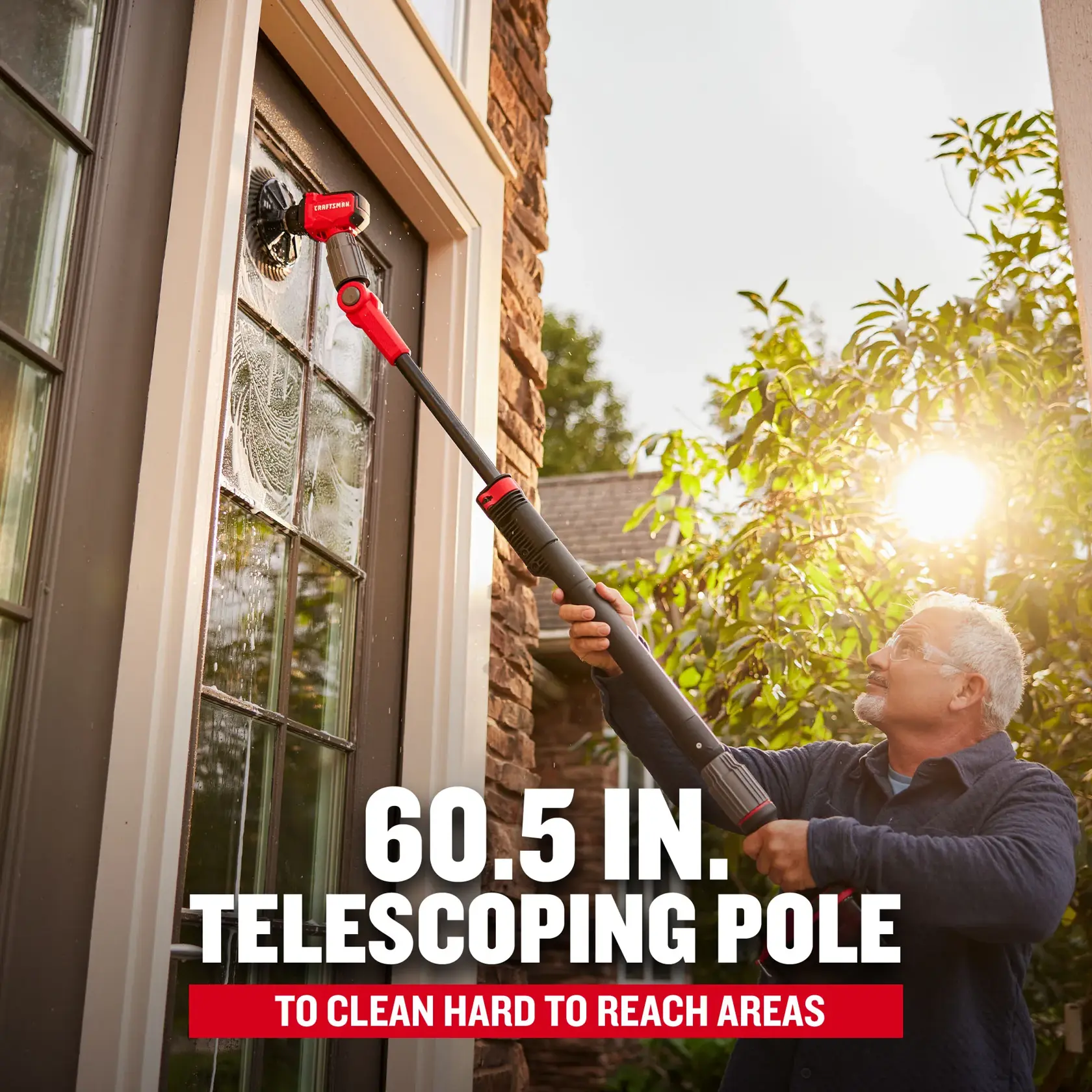 V20 Scrubber Brush man cleaning window with extension pole  Graphic