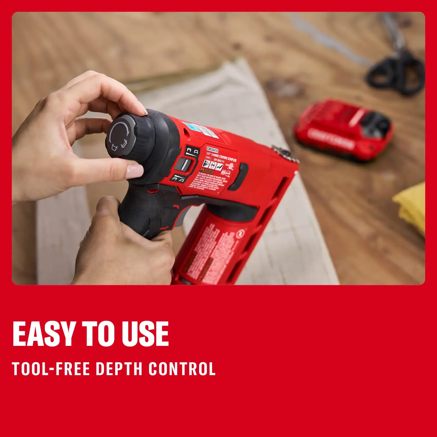 Photo of Craftsman CMCN410B cordless stapler being adjusted for tool-free depth control, on a work surface.