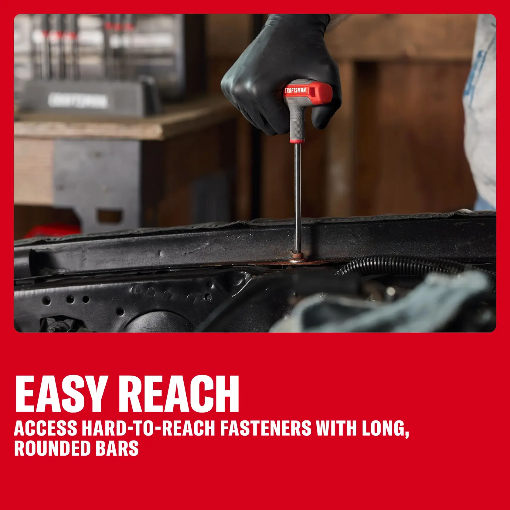 Person uses a CRAFTSMAN T-handle tool to reach and adjust a fastener in a car engine area.