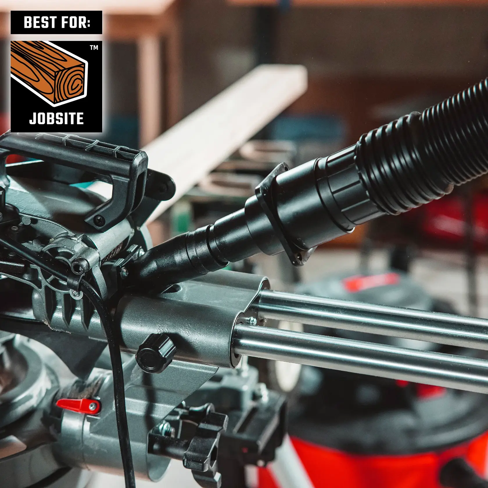 Miter saw dust port attached to a 2-1/2 in vac hose using the CRAFTSMAN Power Tool Adapter