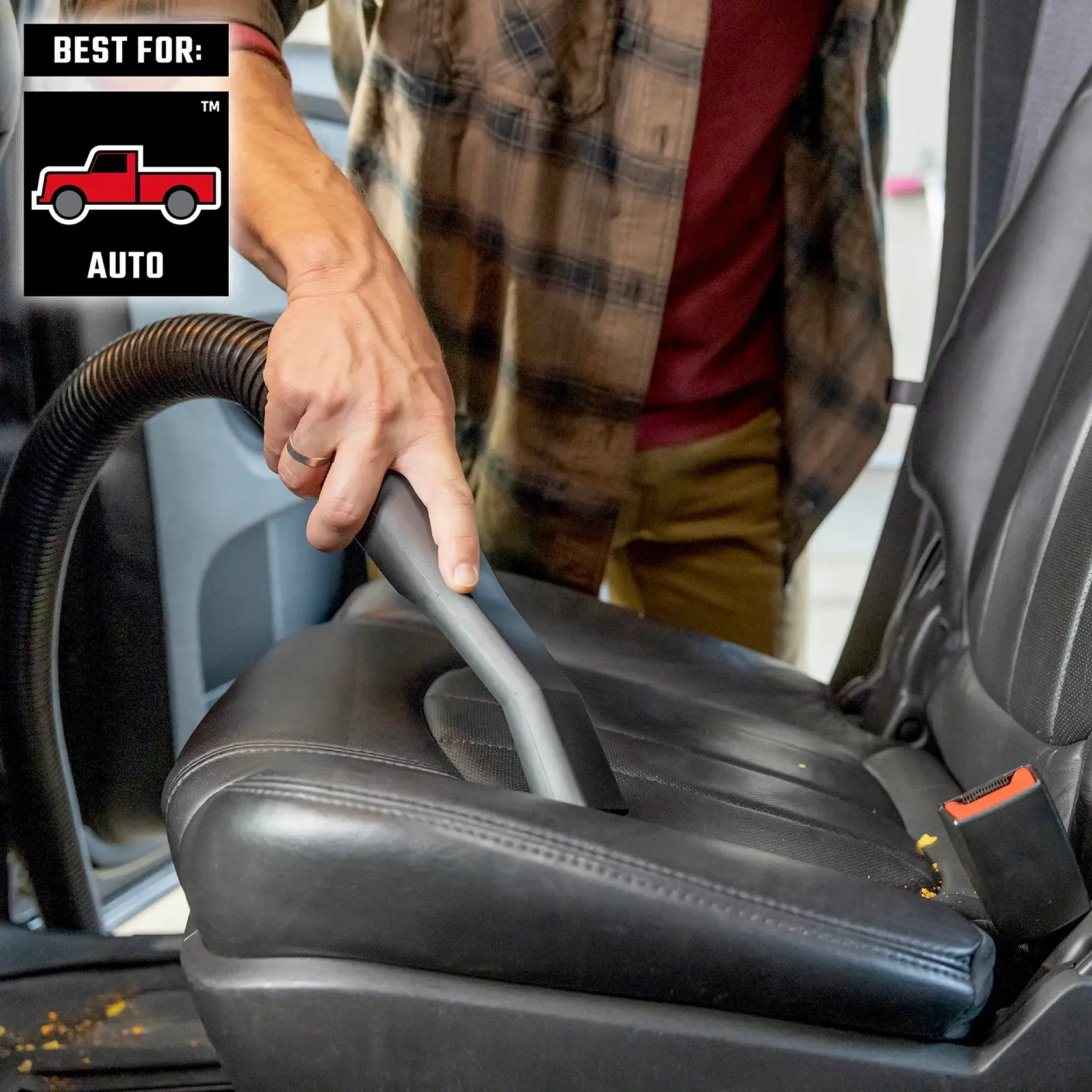 Man using CRAFTSMAN Vac with General Dirt Filter, Hose and Car Nozzle to clean seat inside car