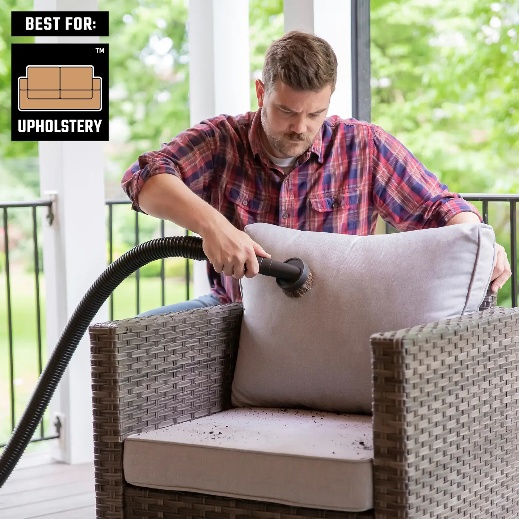Man vacuuming outdoor patio cushions with CRAFTSMAN 1-1/4 inch Natural Hair Dusting Brush Attachment