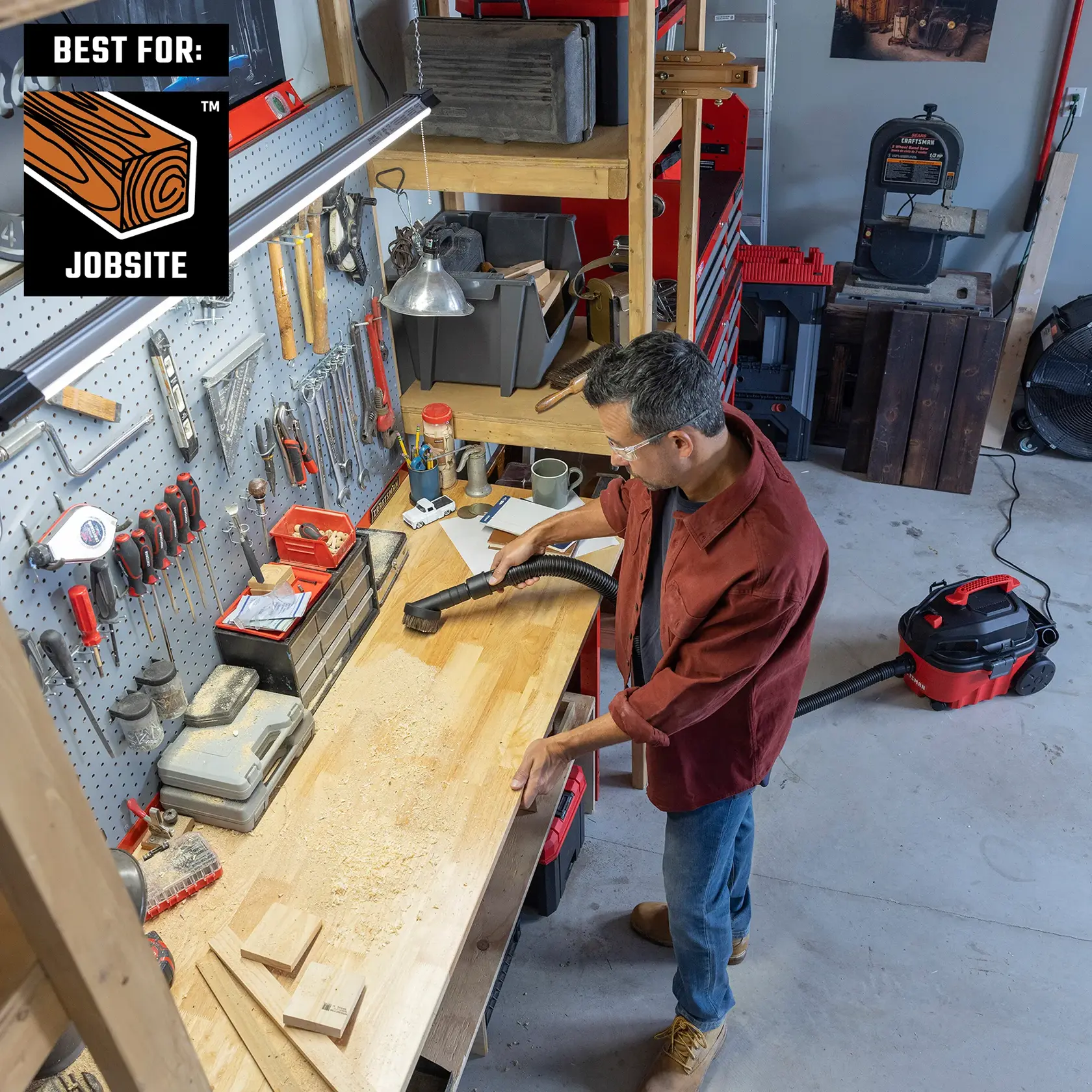 Man cleaning workbench using vac with CRAFTSMAN 1-1/4 inch Natural Hair Dusting Brush Attachment 