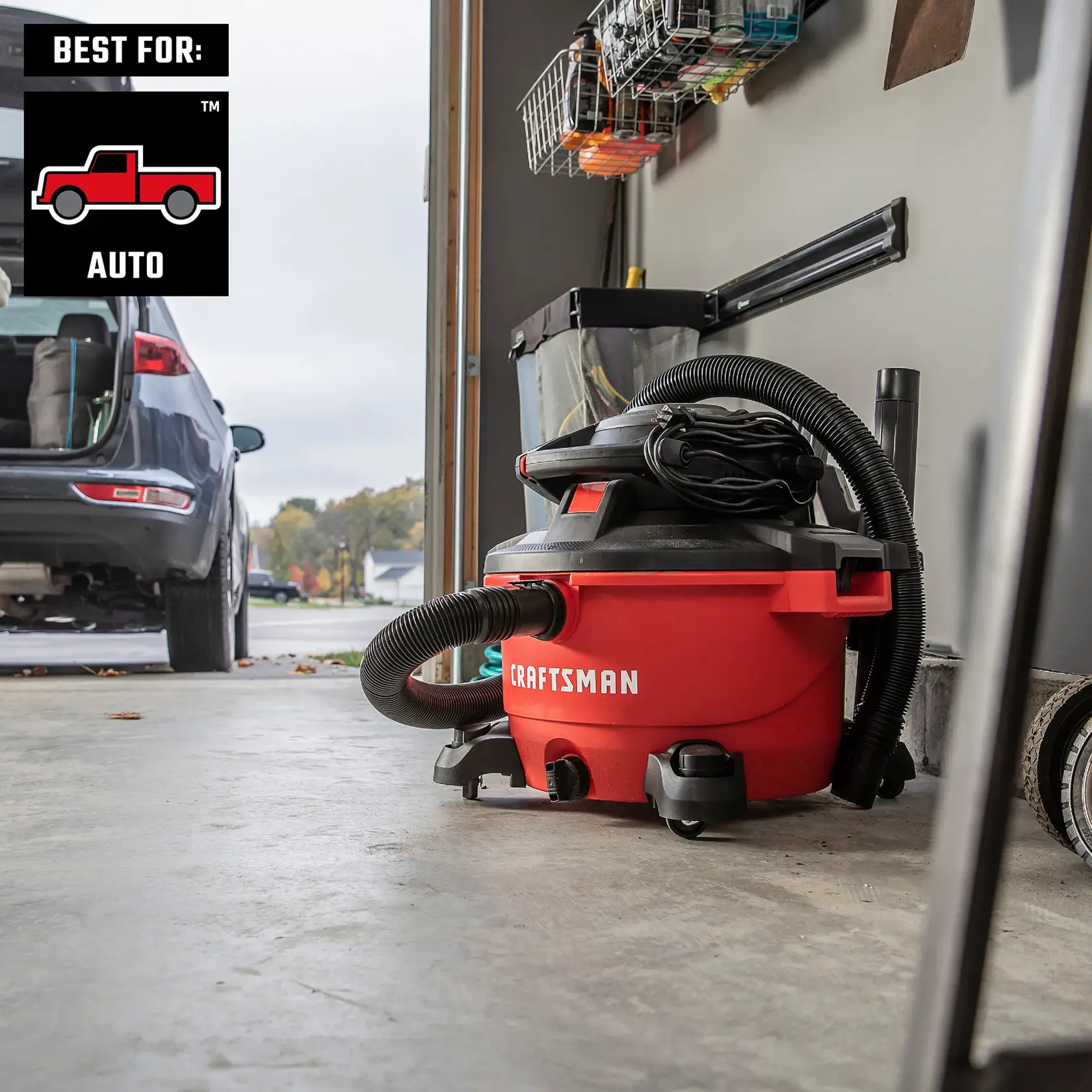 CRAFTSMAN 12 gallon vac with detachable blower neatly stored in garage with all accessories onboard