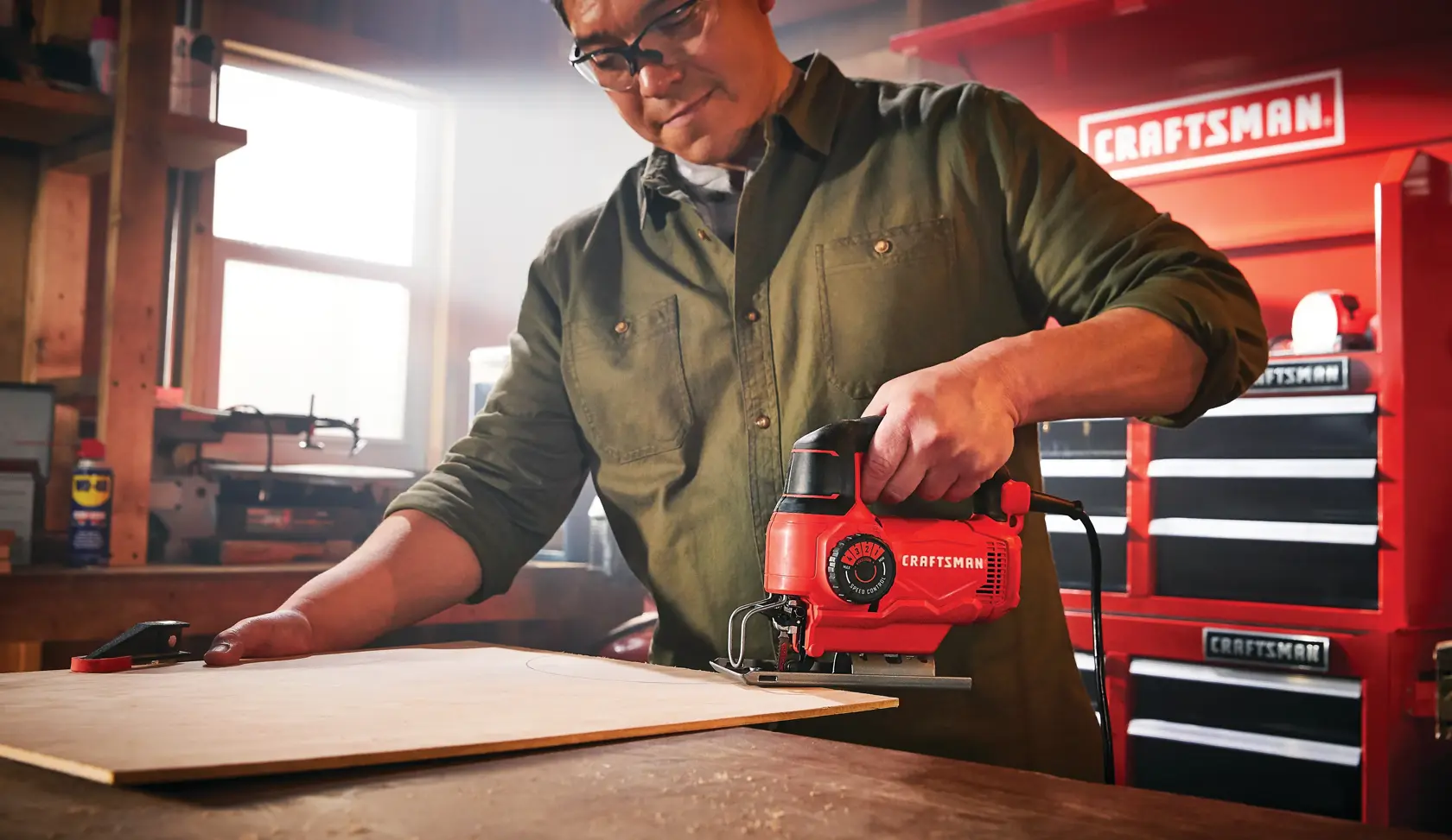 5 amp variable speed jig saw being used by a person.