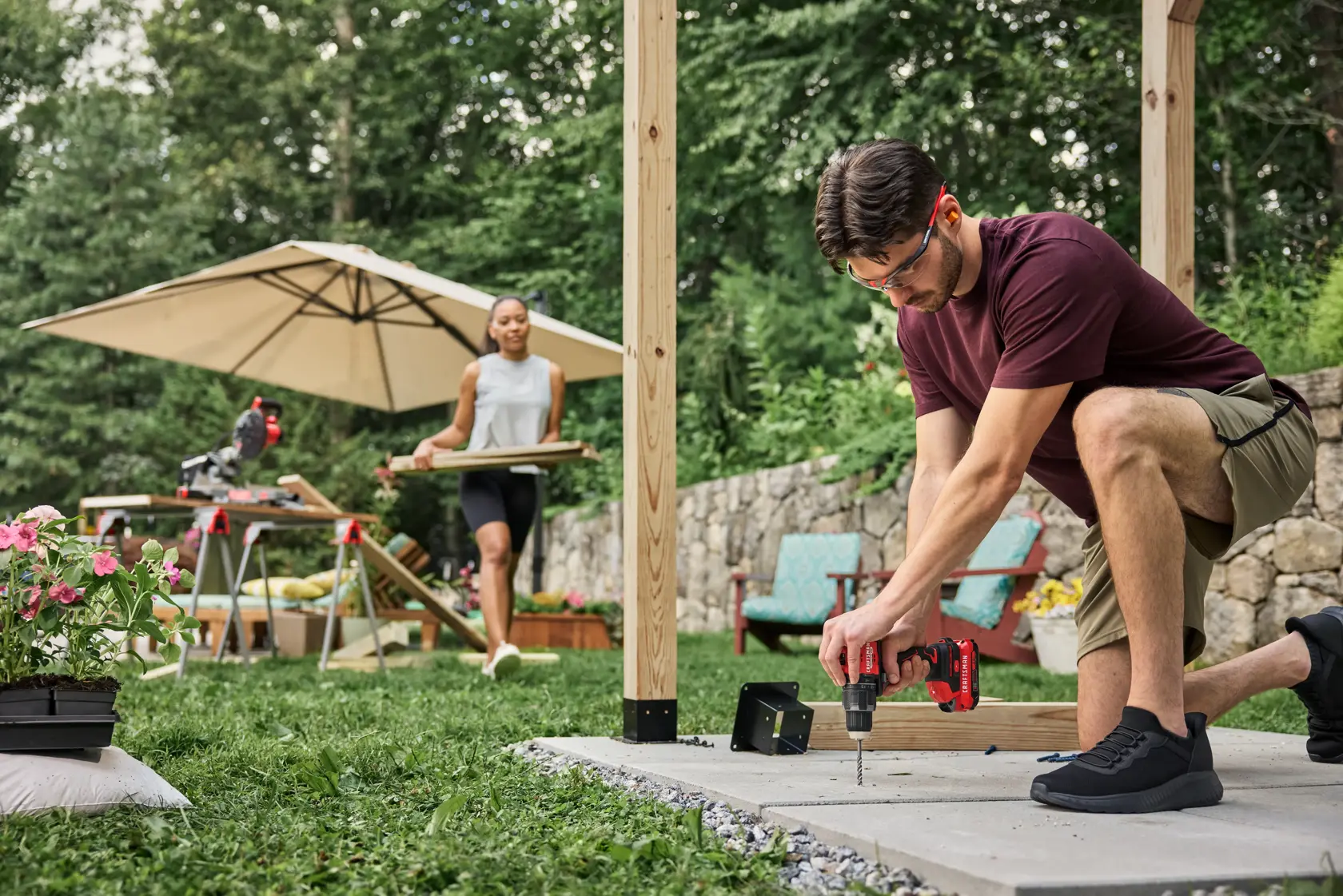 Wide angle of man drilling into cement with the CRAFTSMAN® V20* BRUSHLESS RP™ Compact Hammer Drill/Driver.
Battery and Charger Sold Separately
