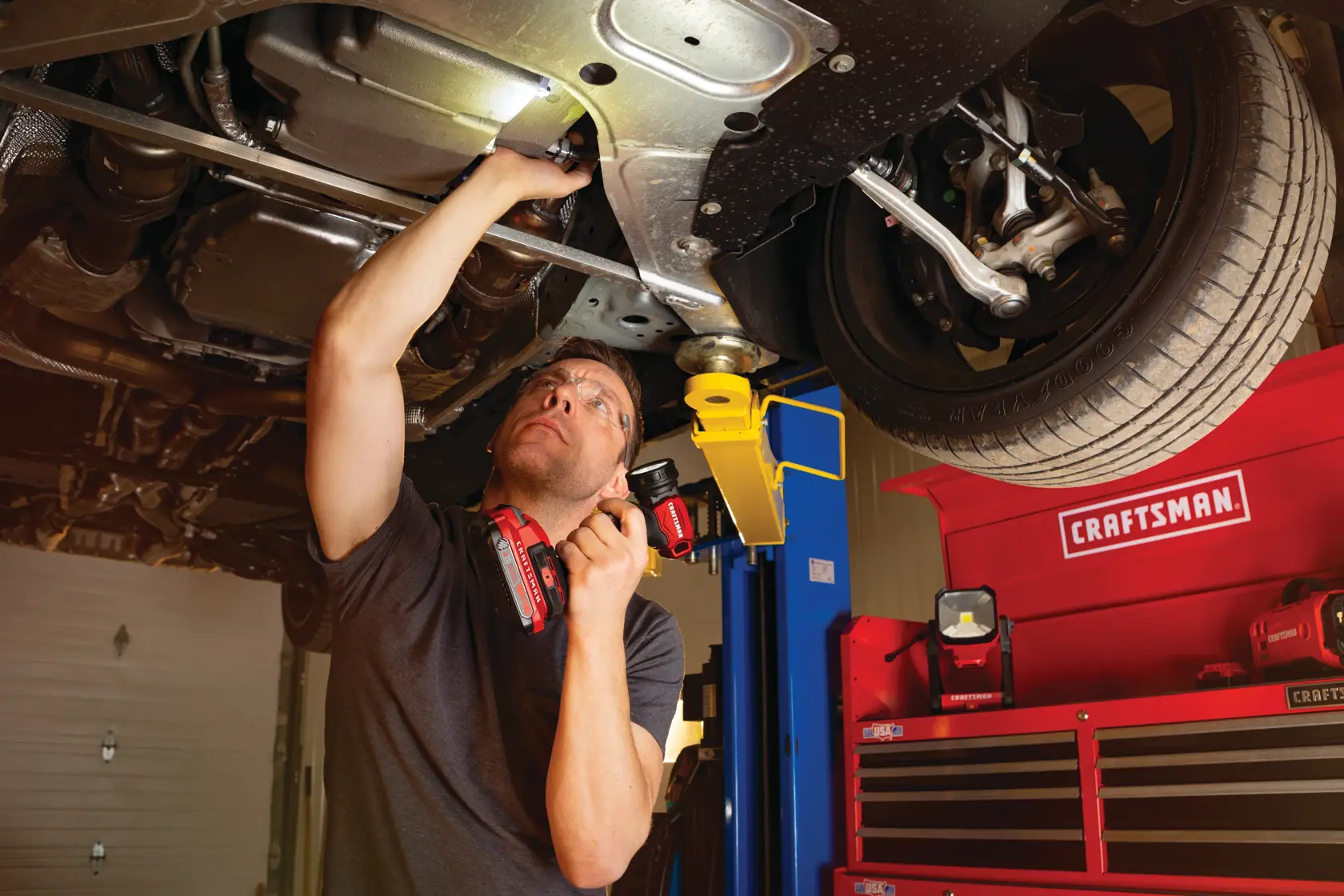 Cordless task light tool only being used to fix car engine.