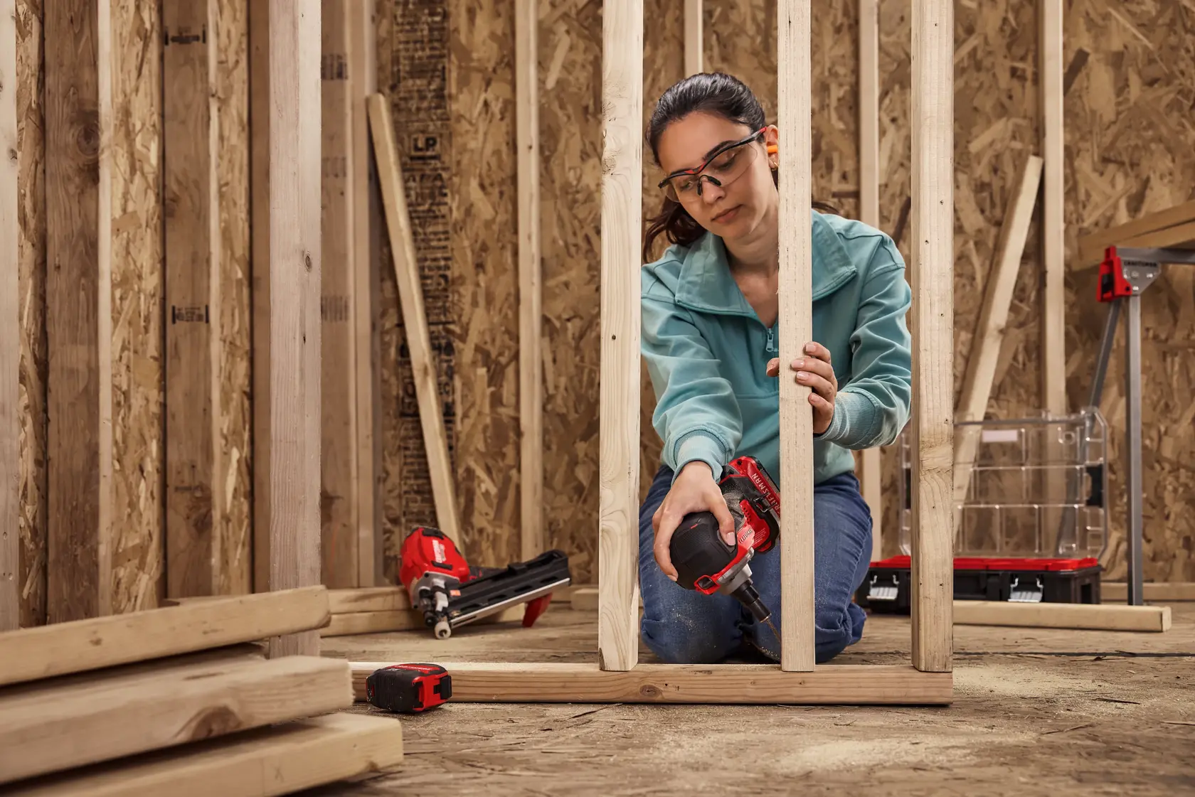 Battery and Charger Sold Separately
Woman nailing into framing with the CRAFTSMAN® V20* Palm Nailer
Additional Items Pictured Not Included