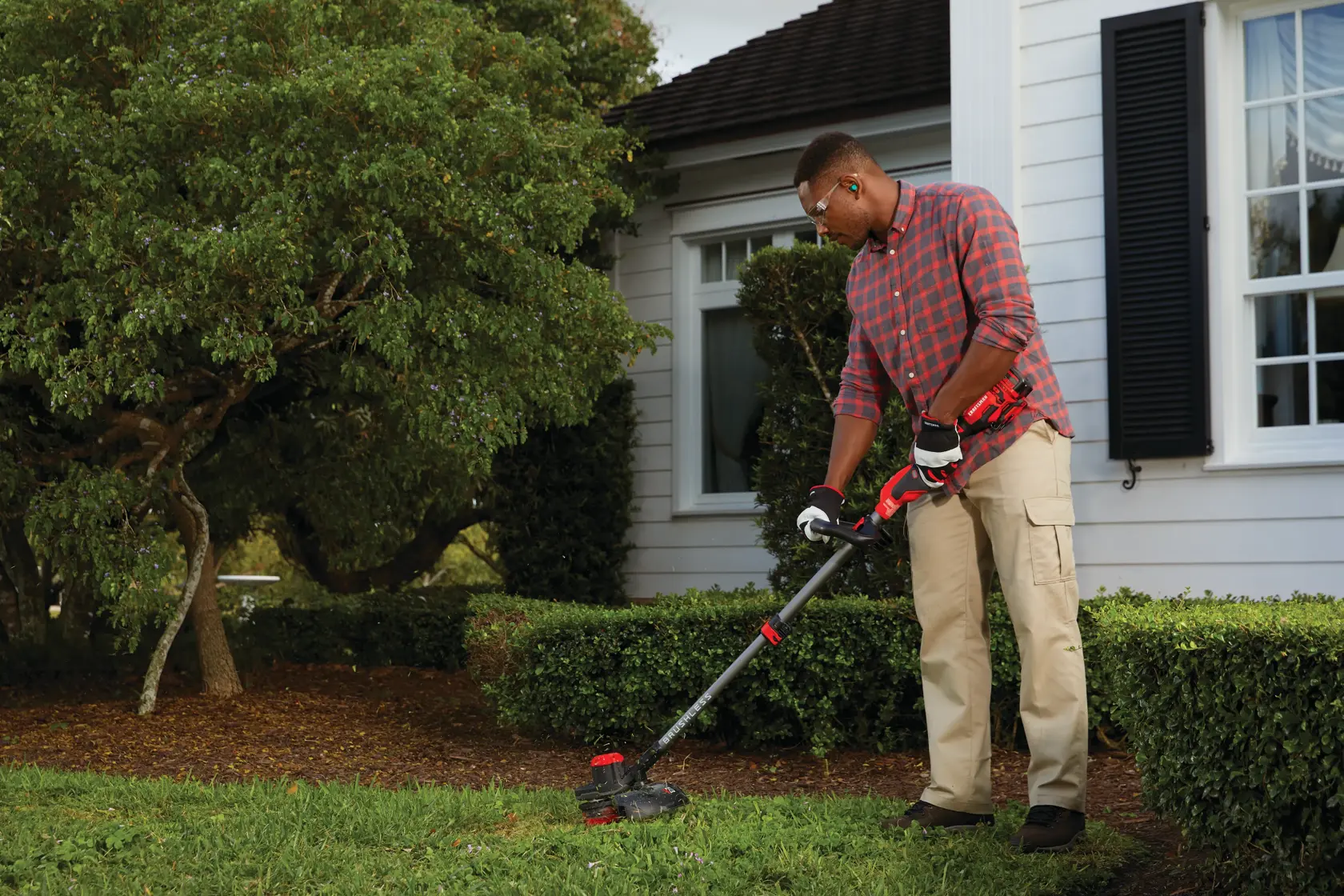 View of CRAFTSMAN String Trimmers  being used by consumer
