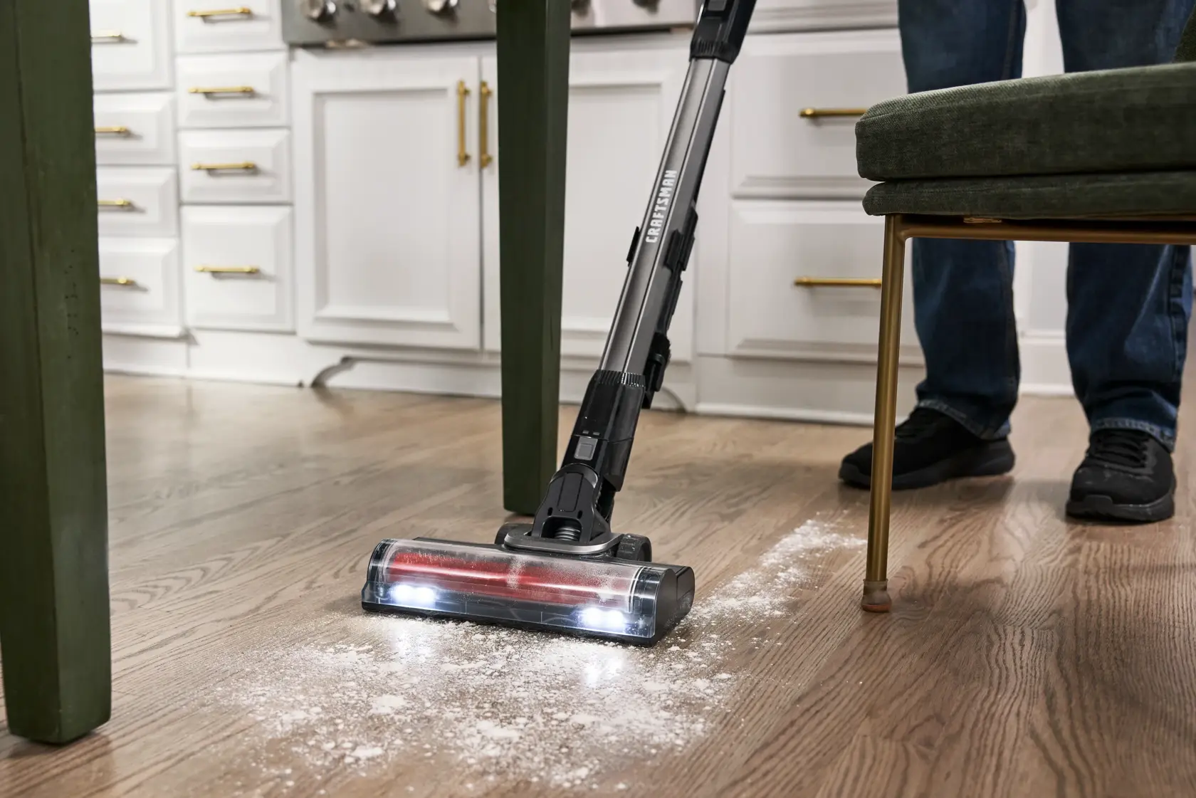 Close up of CRAFTSMAN V20* BRUSHLESS RP™ Cordless Stick Vacuum cleaning up flour straight on
