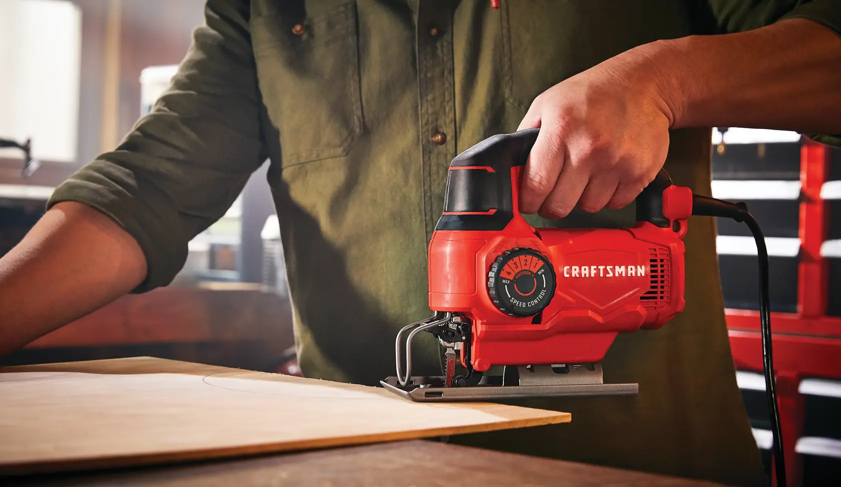 5 amp variable speed jig saw being used.