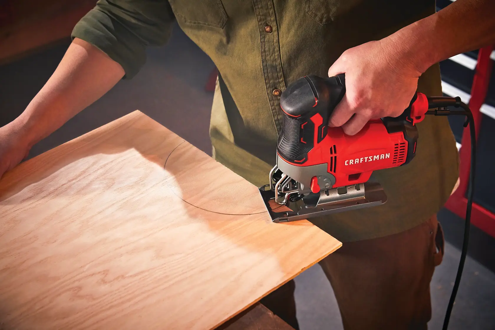 6 amp variable speed jig saw being used.