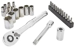 A set of shiny chrome ratchet wrenches, sockets, a socket extension, and various screwdriver bits arranged on a white background.