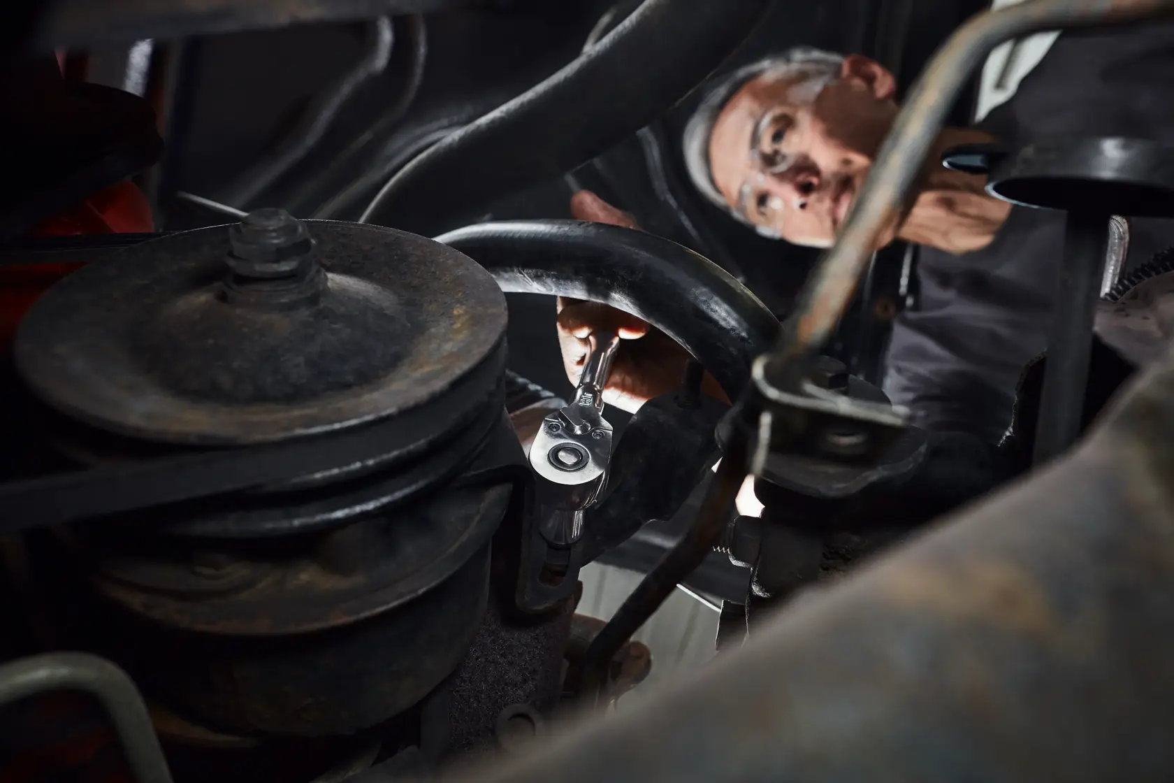 User working in tight area with CRAFTSMAN rachet