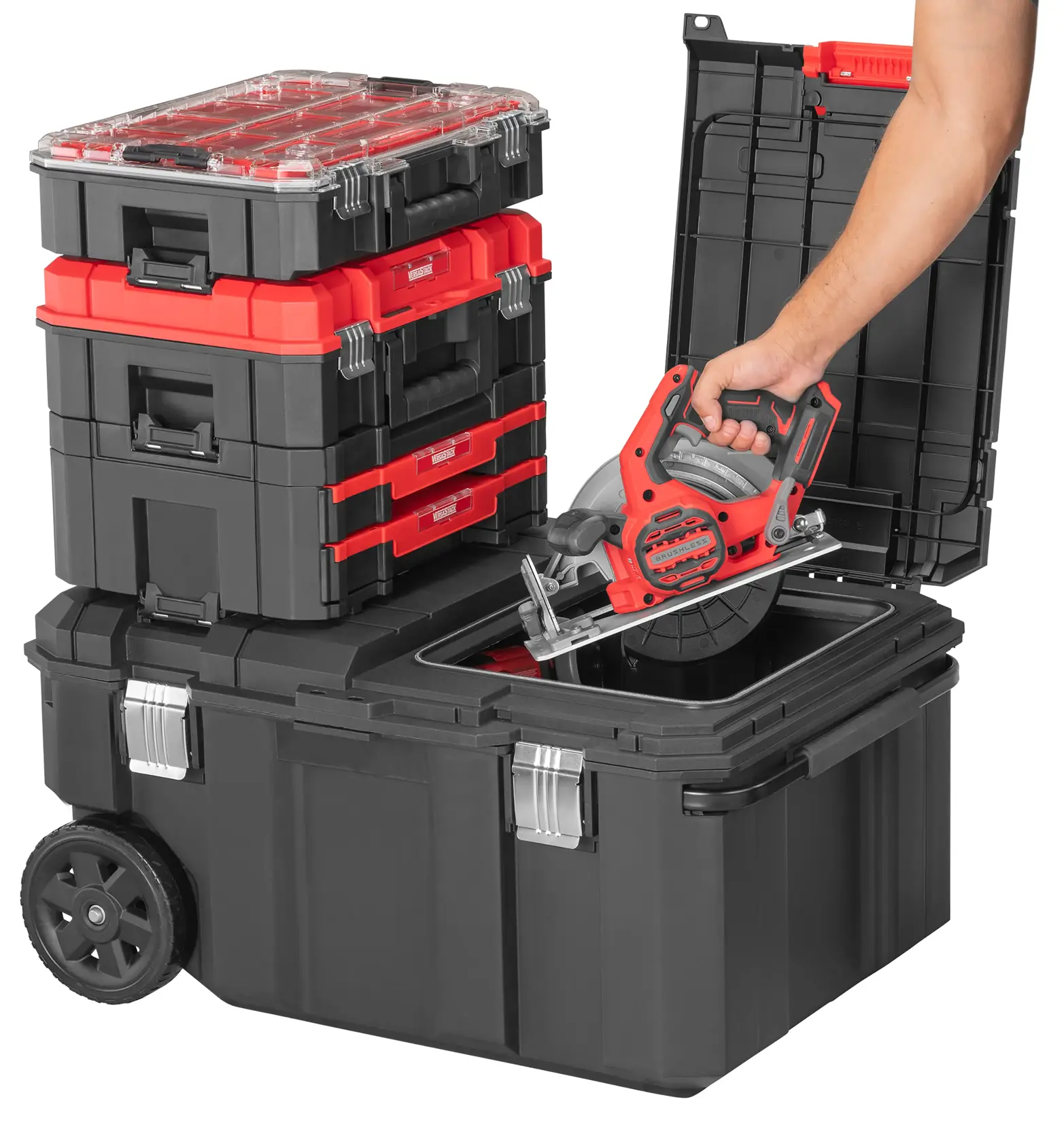CRAFTSMAN VERSASTACK 30 Gallon Chest with additional VERSASTACK products attached with tool being placed inside