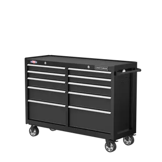 Photo of Craftsman black rolling tool chest with nine drawers, side handle, and visible wheels, SKU CMST98273BK, angled view.