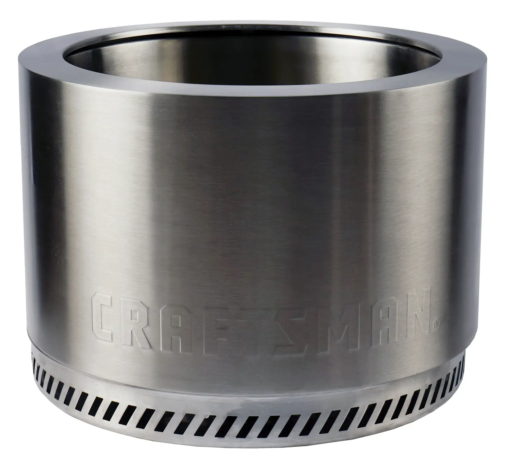 A stainless steel cylindrical outdoor fire pit with ventilation holes near the base and the word 'CRAFTSMAN' embossed on the front.