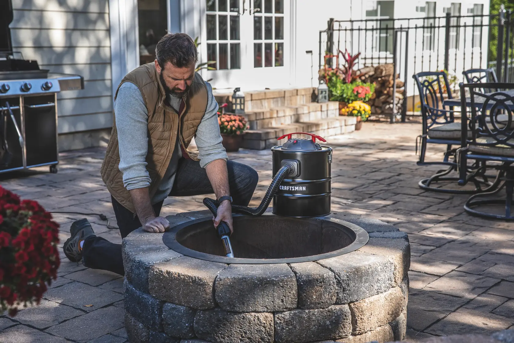 5 gallon 3.0 Peak h p ash vacuum being used to remove ash.