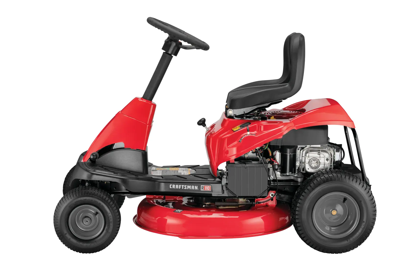 Profile of 30 inch 10 h p gear drive mini riding mower with mulching kit.