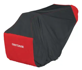 A large outdoor equipment cover in black and red colors with the word 'CRAFTSMAN.' printed on the front. The cover is designed to protect machinery such as a snow blower or lawn equipment.