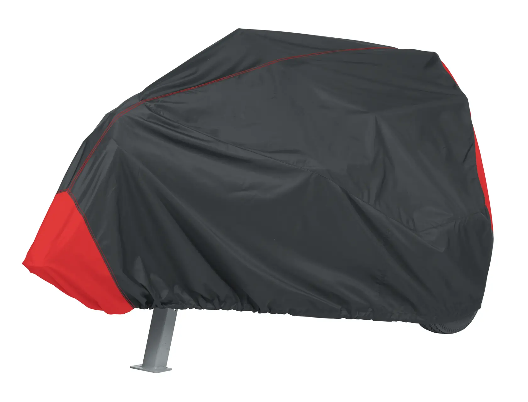A black and red protective cover draped over an object with metal legs, photographed against a white background.