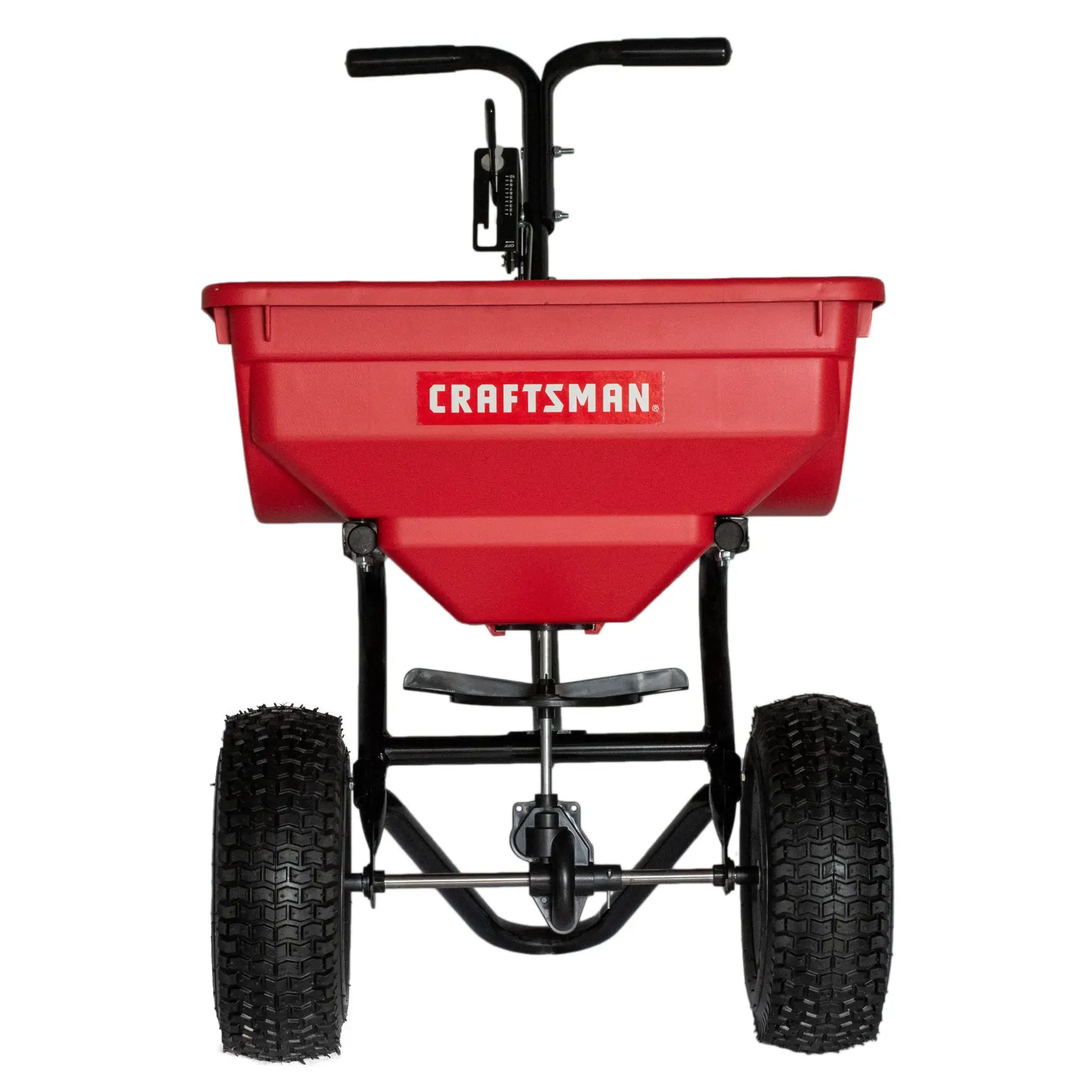 Front view of a red Craftsman broadcast spreader with large black wheels and a handle, used for lawn care and gardening.