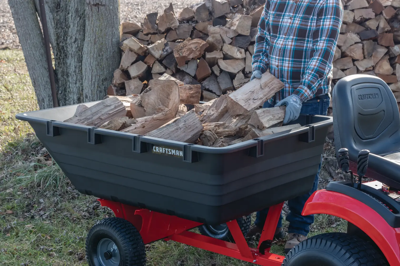 17 cubic foot poly cart being used to carry wood.