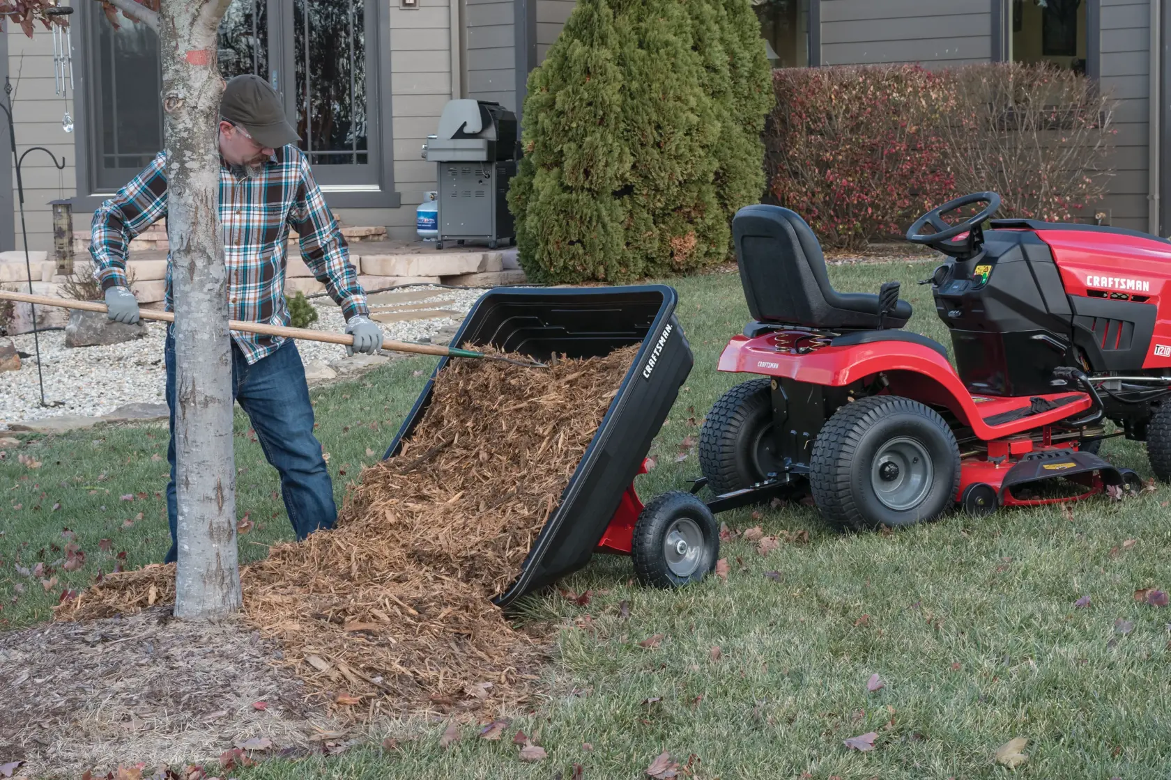 10 cubic foot poly cart being unloaded by person.