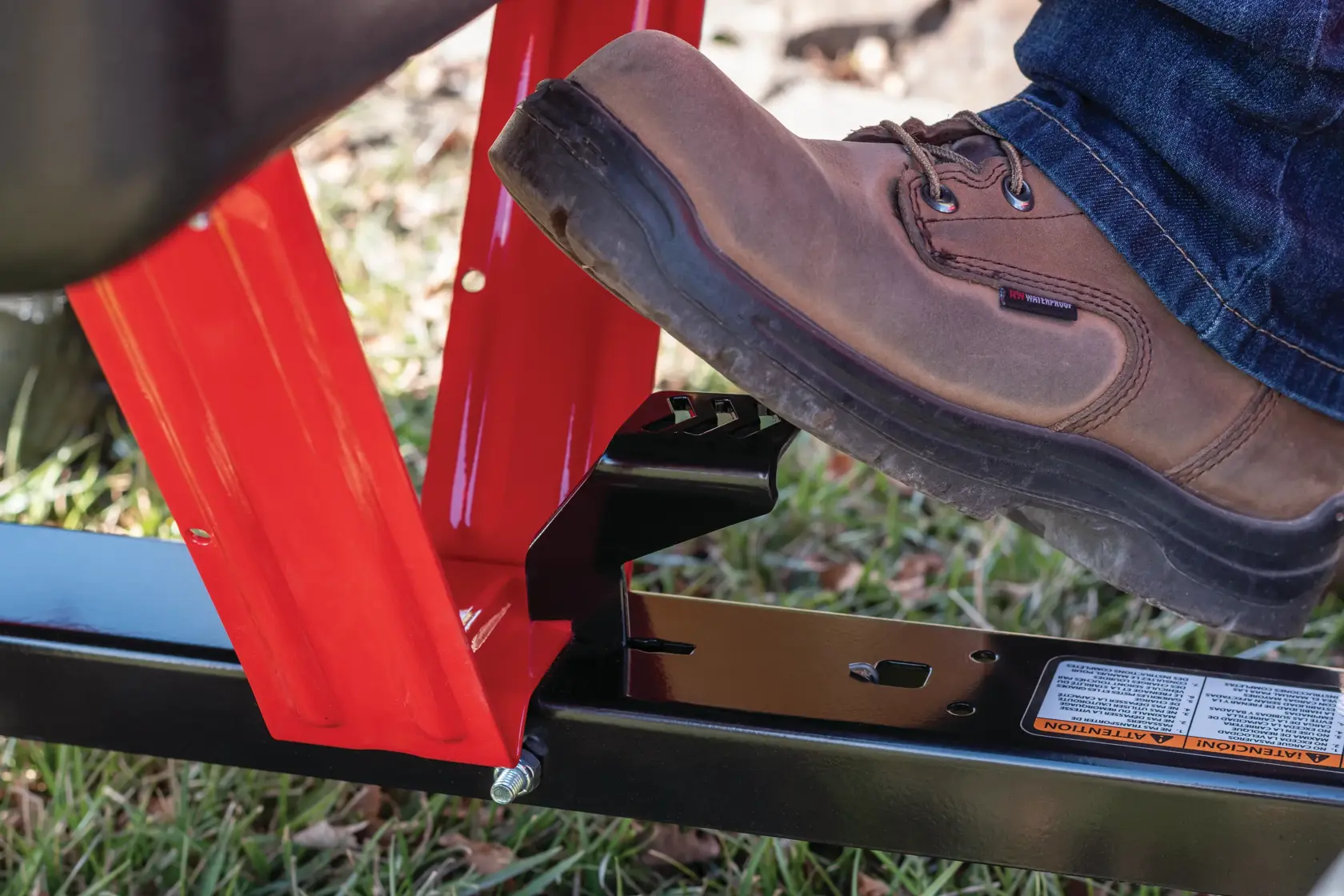 10 cubic foot poly cart foot pedal dump release being used.