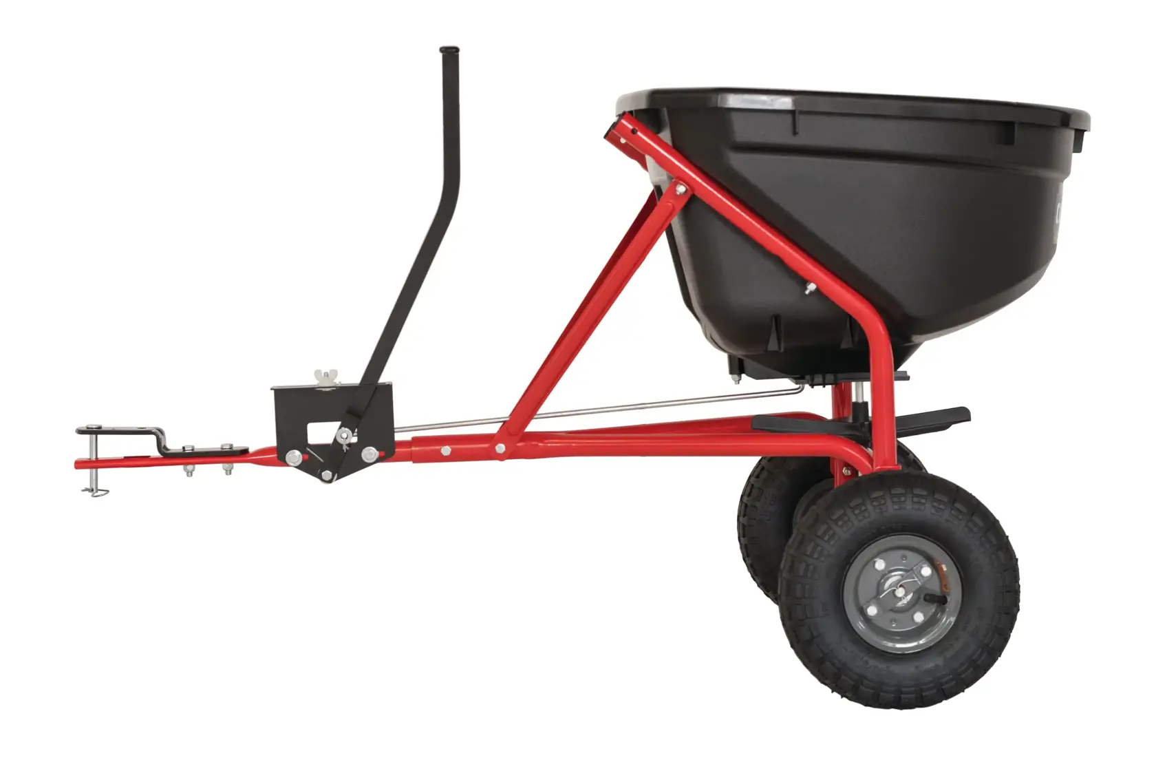 Craftsman tow-behind spreader, SKU CMXGZBF7124571, side view on white background, red frame, black hopper, two wheels.