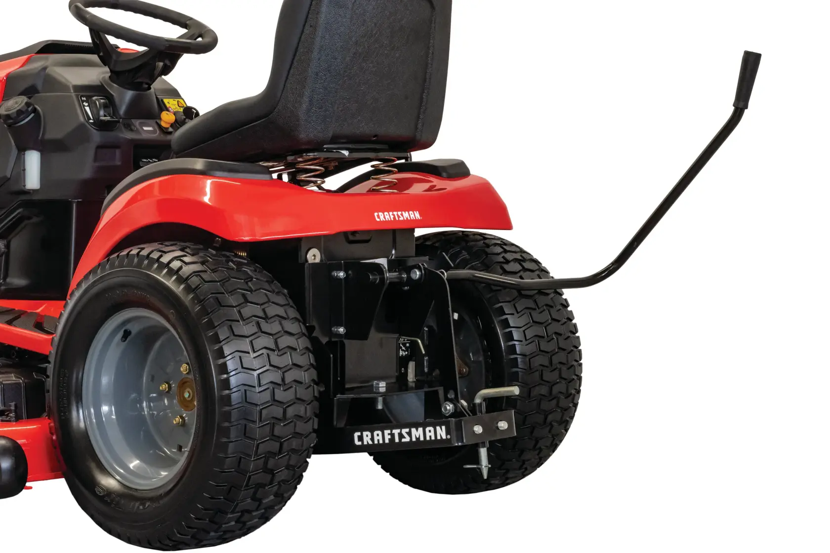 Sleeve hitch being attached to lawn mower.