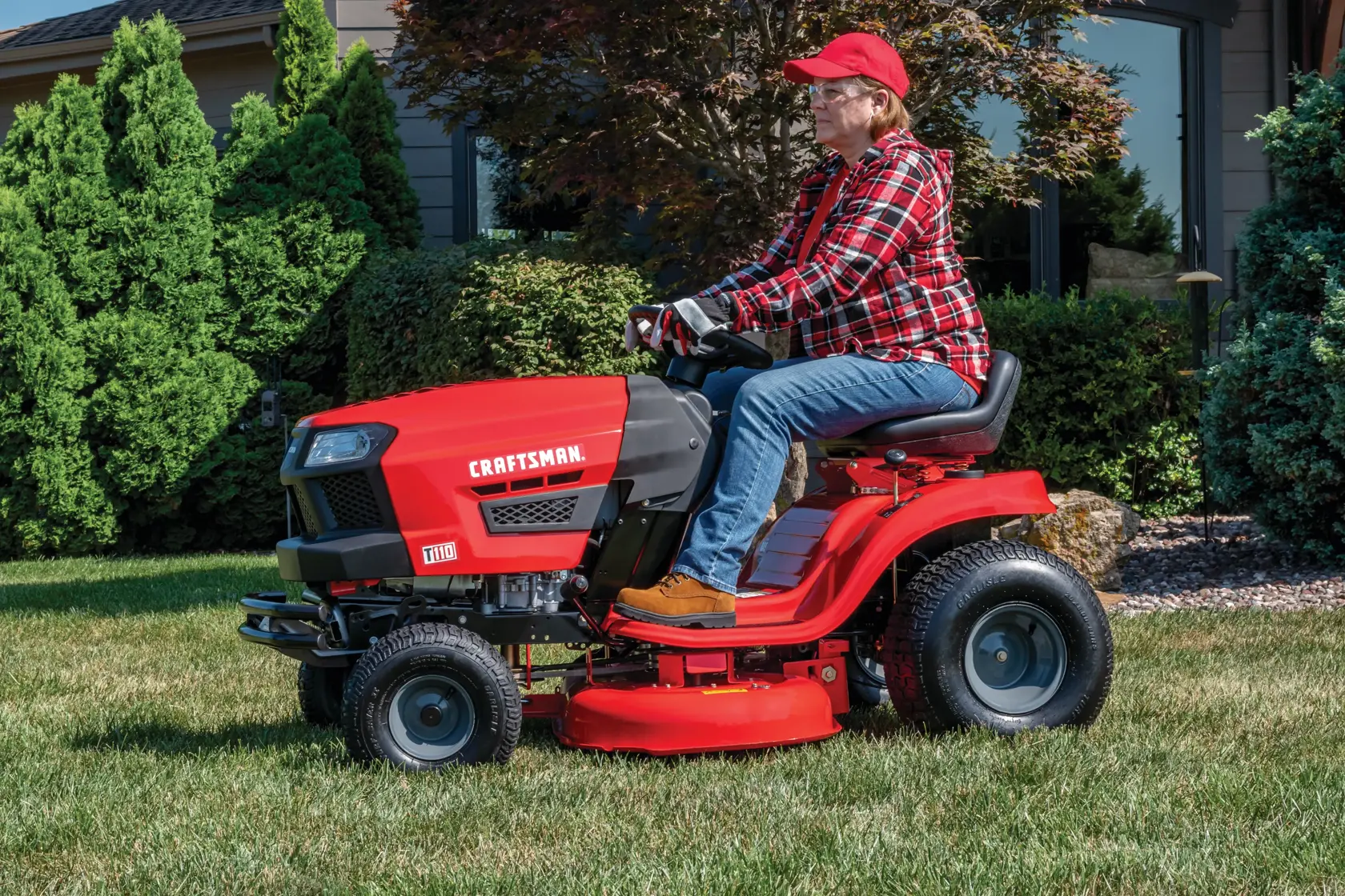 Dual bar bumper being attached to front on lawn mower.