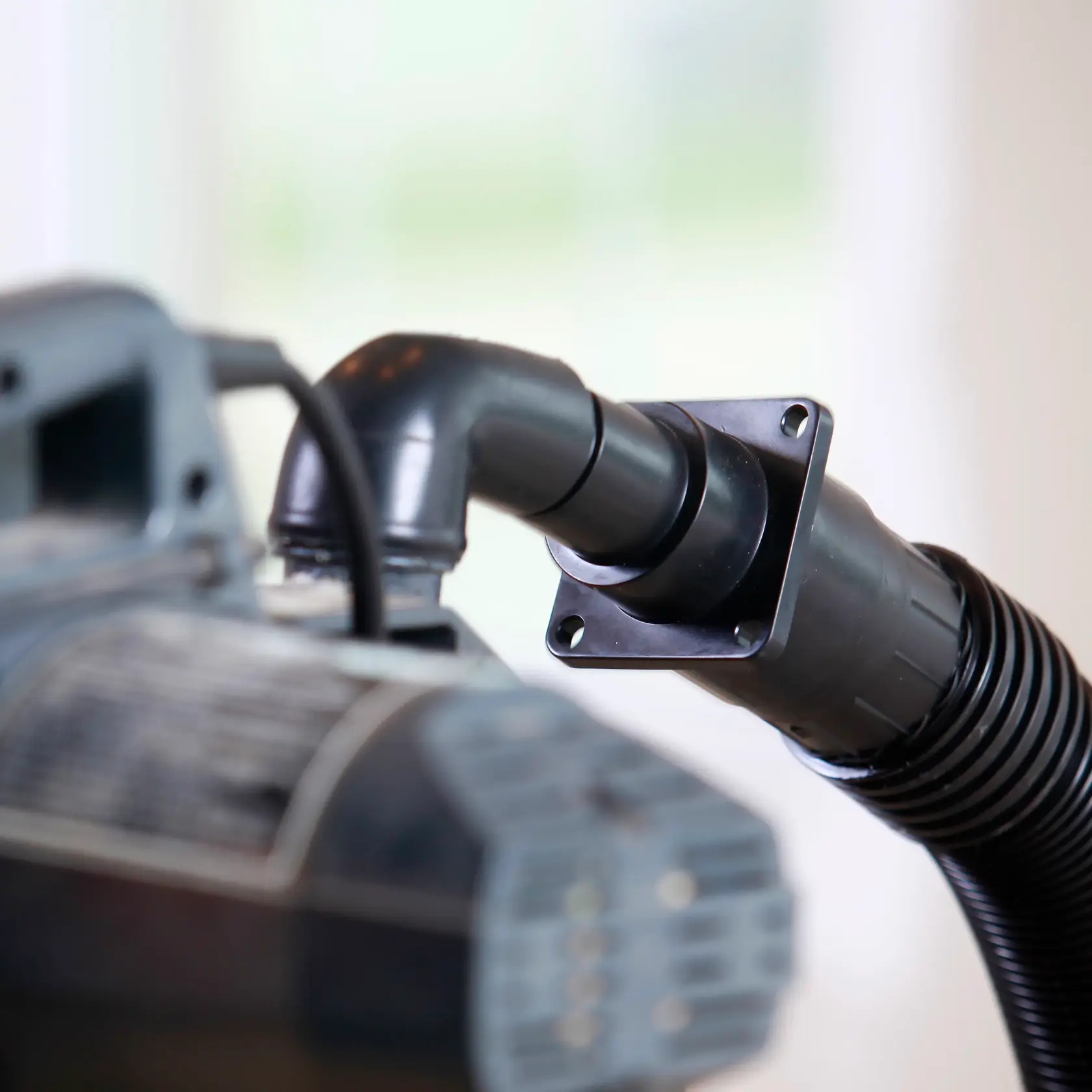 CRAFTSMAN 2-1/2 inch Power Tool Adapter connects to a miter saw dust port elbow for dust collection