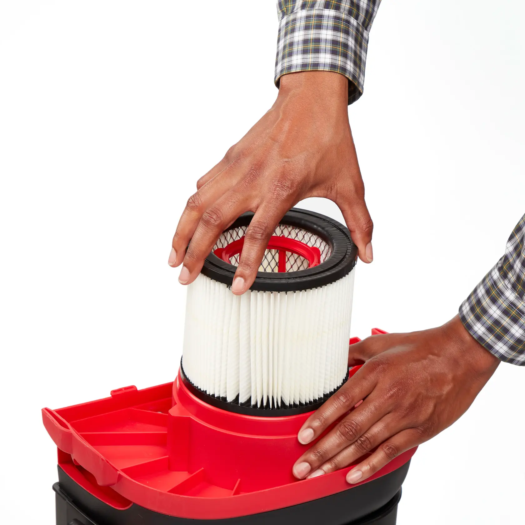 Person installing General Dirt Replacement Filter onto Shop-Vac brand wet/dry vac powerhead