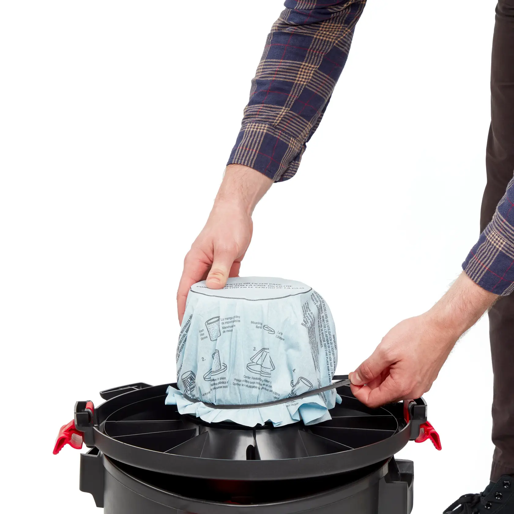 Side view of CRAFTSMAN fits Shop-Vac dry filter installation on filter cage on underside of vac lid