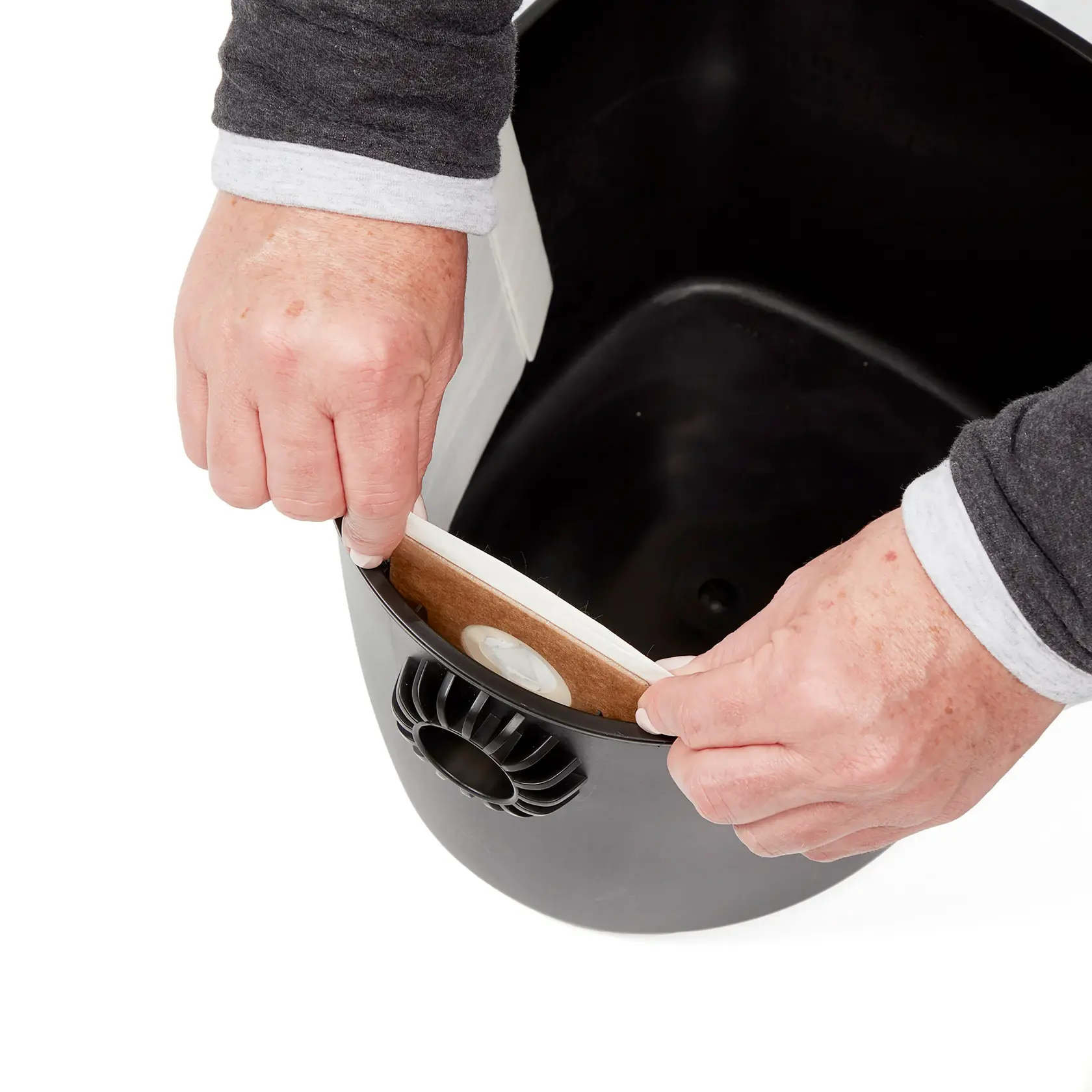 Top view of CRAFTSMAN fits Shop-Vac 2-2.5 gallon dust bag installation on inlet inside shop vac drum