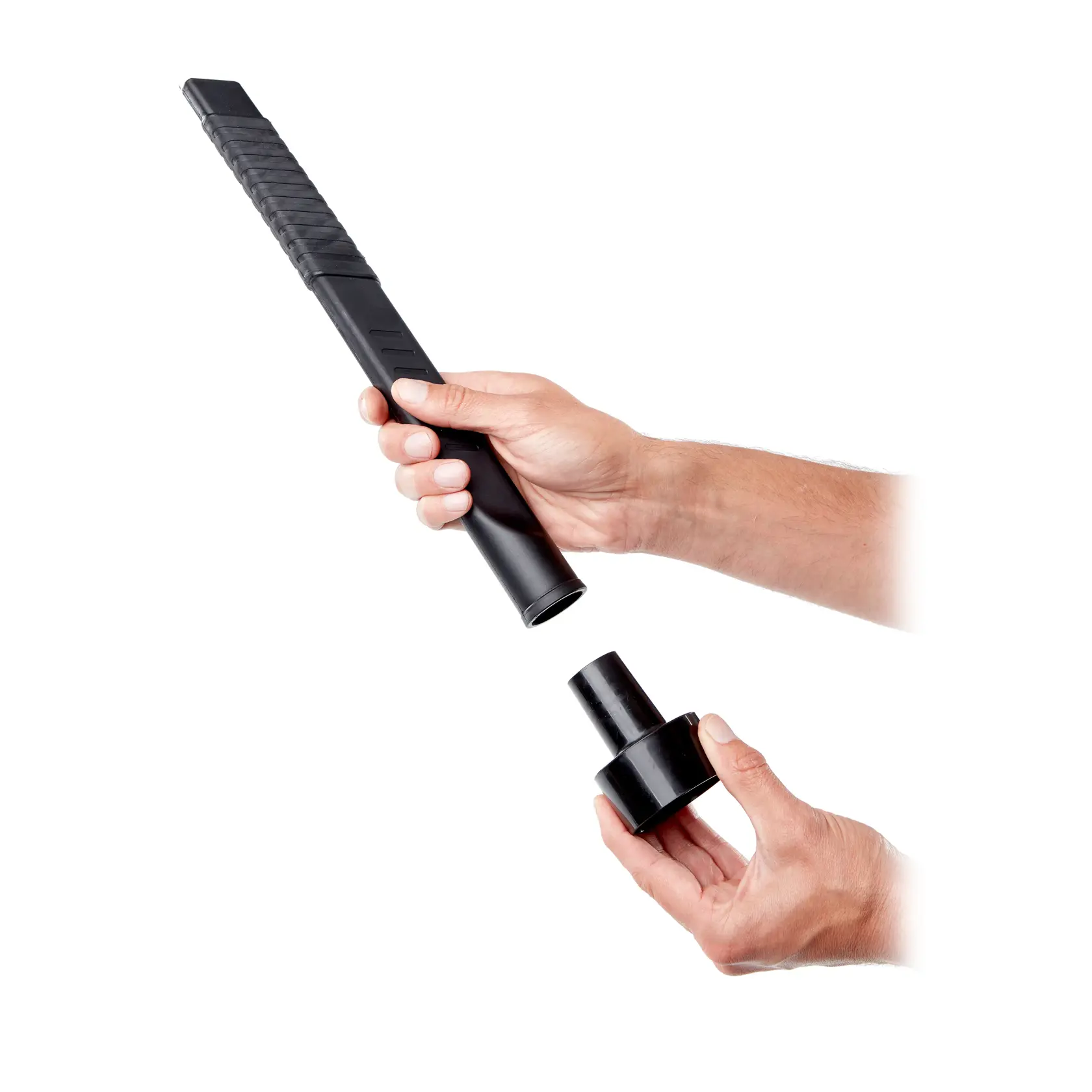 Person illustrating how to install 1-1/4 inch crevice tool to 1-1/4 inch to 2-1/2 inch adapter 